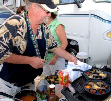 Chef Emile grilling Touchdown Seafood Platters