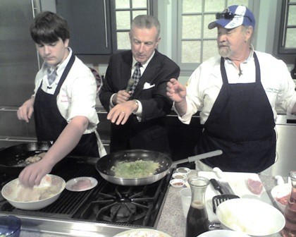 Dan and I are on camera, cooking Grillades