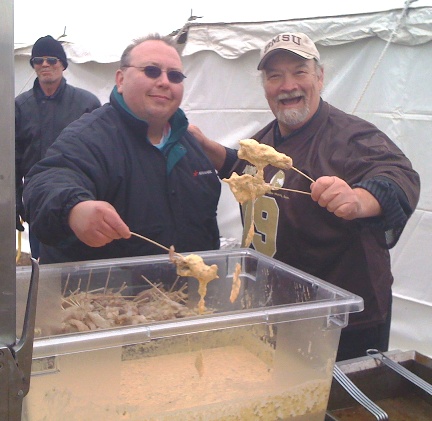 Chef Dennis Nord batters Alligator on a Stick