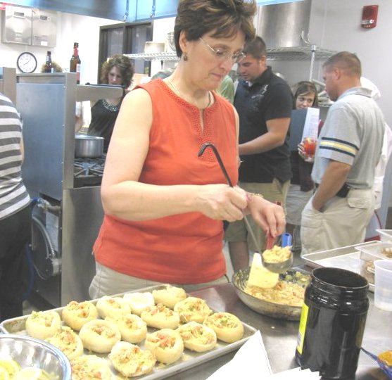 Ann Campagna stuffs some Crawfish Pirogues